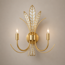 18.5-Inch Two-Light Wall Sconce in Antique Brass with Off-White Leaf Accents.