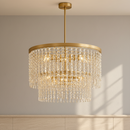 Rubina 30-Inch 12-Light Chandelier in Burnished Gold with Light Amber Crystal Strands.